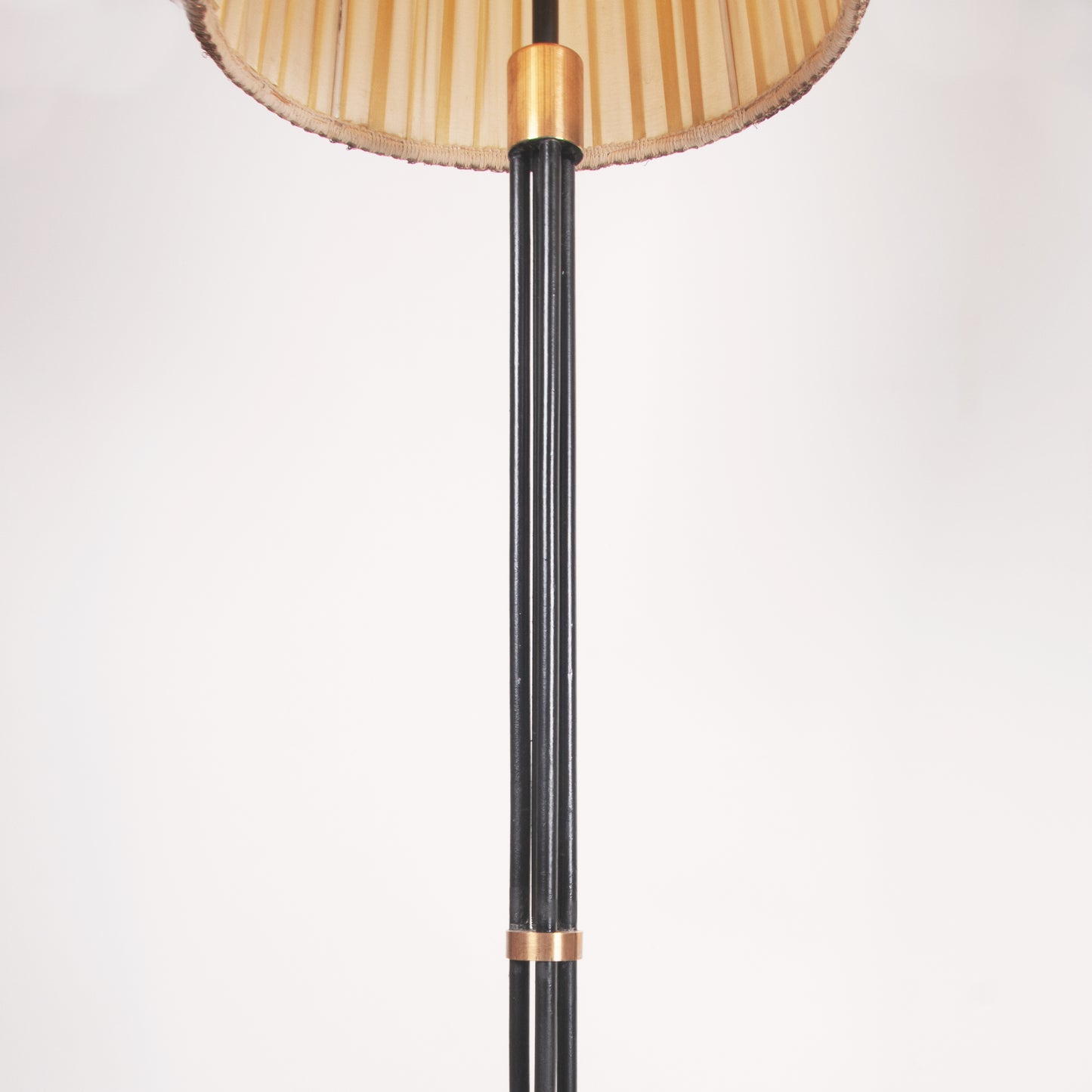 Floor lamp with conical pleated shade