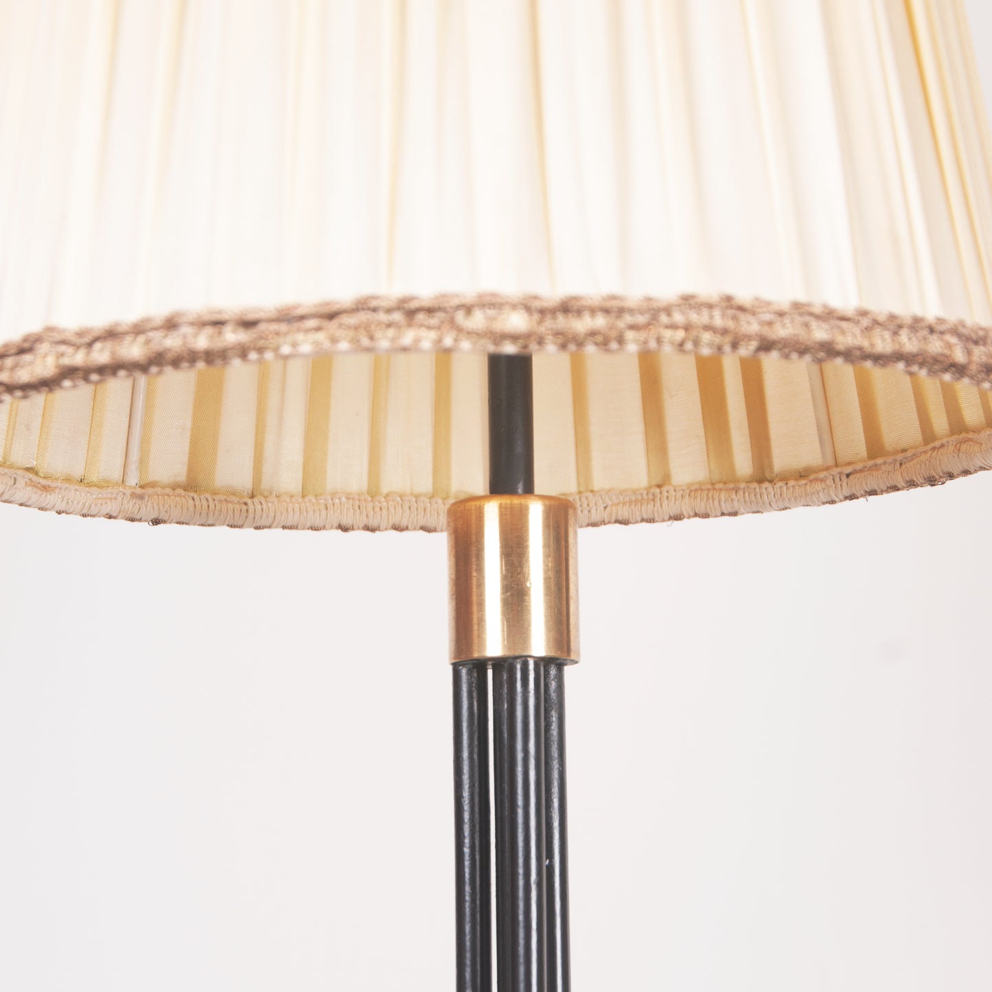 Floor lamp with conical pleated shade