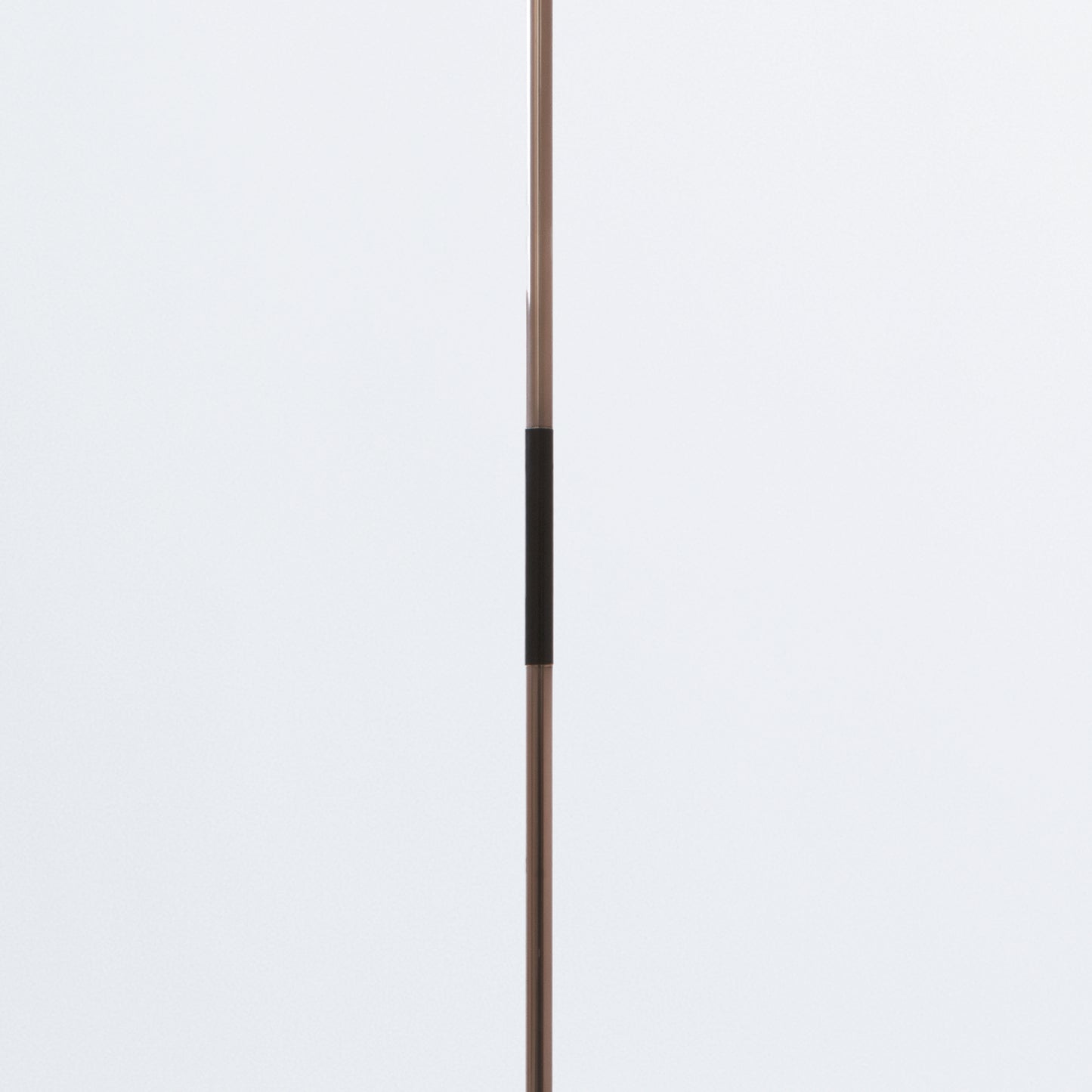Floor lamp on black tripod base
