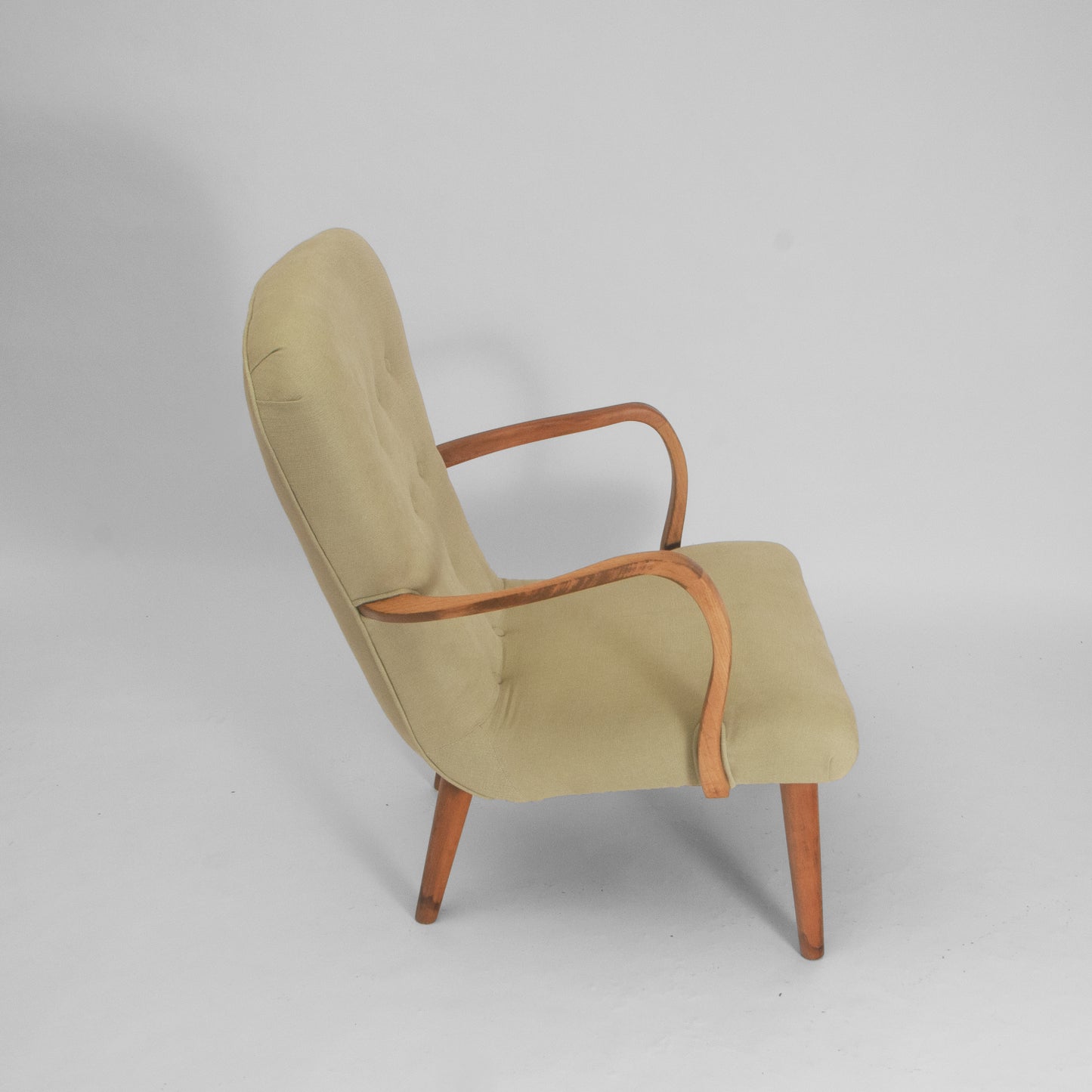 Green lounge armchair