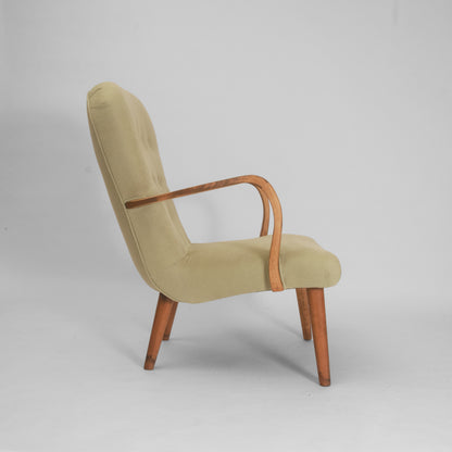 Green lounge armchair