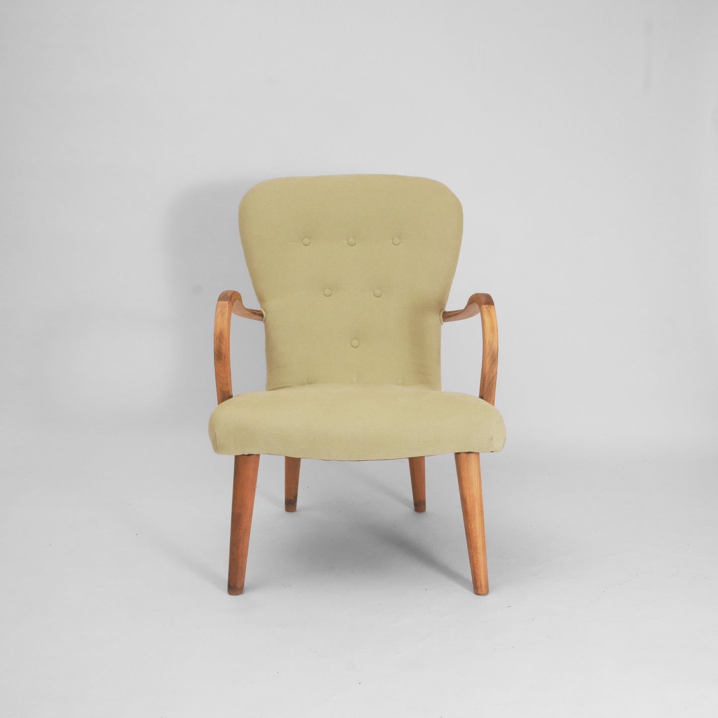 Green lounge armchair