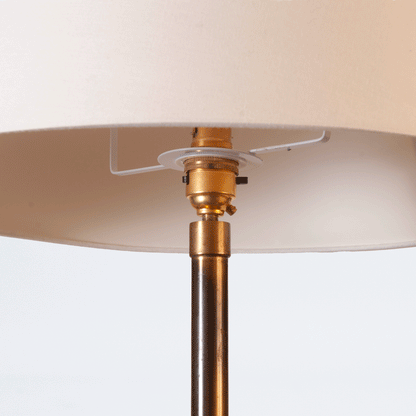 Floor lamp with double tapered stem