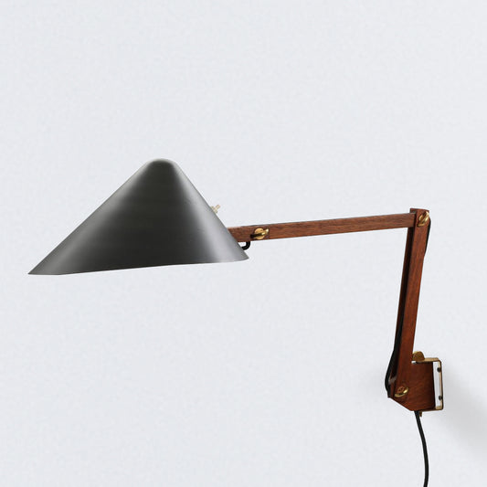 Adjustable wall lamp with metal shade