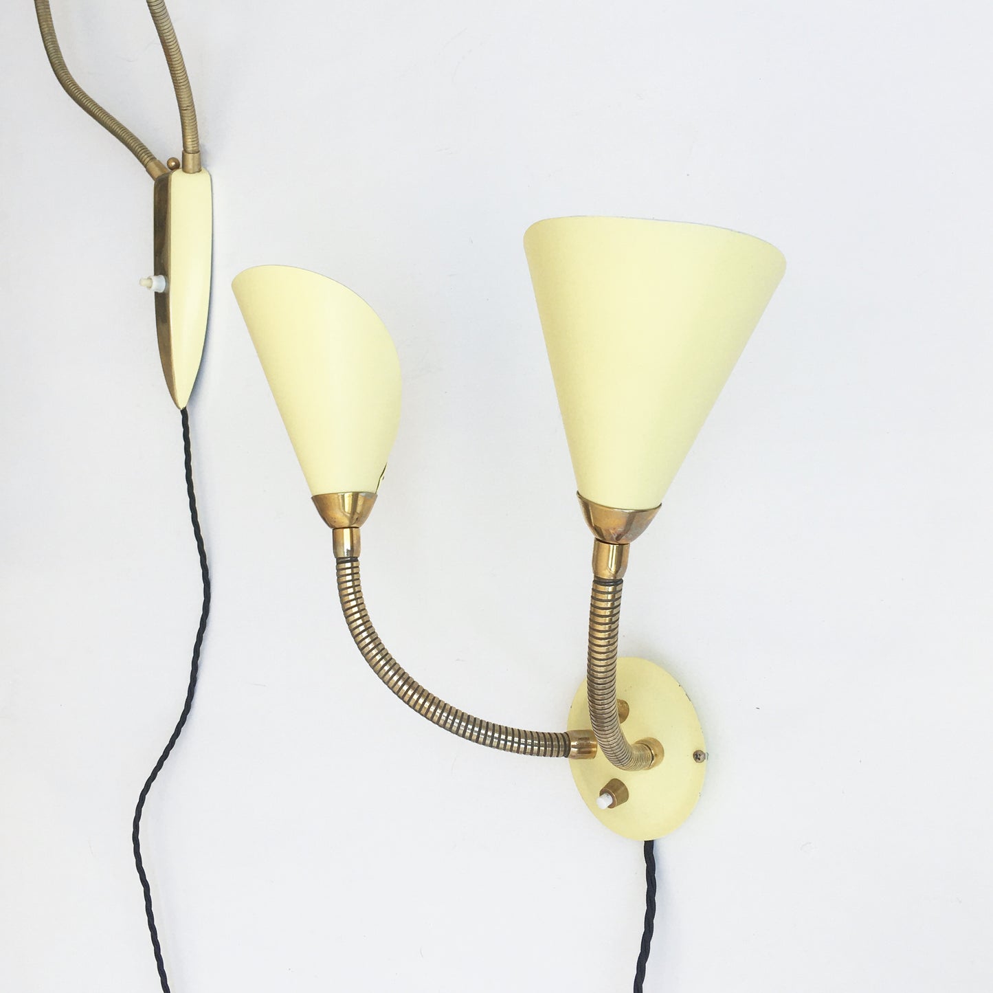 Pair of adjustable wall lamps